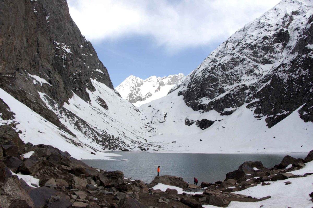 Scenic view of Madhuri Lake (Sangetsar Lake) in Tawang, Arunachal Pradesh surrounded by mountains